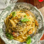 Laura Vitale Instagram - Comment BOOK (no character after the word or it won’t work) and I’ll send you the link directly to make it easier for you (yall really love this feature and I’m so happy❤️❤️❤️❤️) this recipe is such a star and requires very few ingredients but cooked just right creates absolute magic!!! Sitting here eating a bowl of this spaghetti alla nerano-ish transports me to warm summer days sitting at my favorite place in the magic that is Italy and just the thought of that makes life better ❤️ ingredients below, full recipe /instructions and inspo to live your very best life is found At My Italian Table ❤️❤️ 1/2 cup extra virgin olive oil 1 garlic clove 1.5lb small zucchini thinly sliced 1/4 cup of grated parm 1/4 cup of grated pecorino Few basil leaves Salt to taste and plenty of black pepper if you’d like!