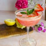 Laura Vitale Instagram - Your Easter/springtime cocktail is ready babes! So good and so easy!! I start by making a really tart strawberry lemon puree, about 1 cup of strawberries, 2 tbsp of sugar and juice of 2 lemons, purée until super smooth. When ready to make cocktails, mix together the following 2oz of vodka (maybe a splash more if you’re fancy) 2oz of strawberry syrup 2oz of Passionfruit Nectar Mix and shake over ice, pour into glass and top with some fizzy lemon lime soda!