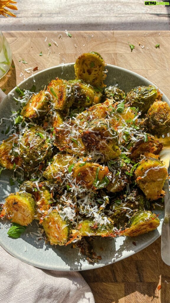 Laura Vitale Instagram - Caio e pepe Brussel sprouts is pretty much the only way I want to eat them right now. So crunchy, salty and peppery, literally the best thing you can make with them and i promise you, even the pickiest eaters will give these a try! I simply toss brussel sprouts with olive oil, salt, pepper and some garlic and herb seasoning, place them cut side down on a baking sheet liner with parchment and generously covered in freshly grated parm, pop them in the oven at 400 for 20ish min and when they come out, peel them from the baking sheet, dowse with more parm and oh so much pepper! So so good! #LVturkeyday2023 #food #foodporn #foodie #instafood #foodphotography #foodstagram #yummy #foodblogger #foodlover #instagood #love #delicious #homemade #dinner #foodgasm #tasty #photooftheday #foodies #cooking #picoftheday #foodpics #instagram #fall #fallfood #thanksgiving #thanksgivingfood #recipe #recipes #easyrecipes