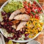 Laura Vitale Instagram - Comment BOWLS (no other letters or emojis after) and I’ll happily send you this recipe directly! It is insane, the flavors, the combination, just all of it together is pure magic. Highly suggest doubling the chicken and marinade so you can have plenty to eat throughout the week on just about anything you like! It’s so good you won’t even believe it and perfect if you’re a meal prep person and try to get that protein in but you love flavor 🤣