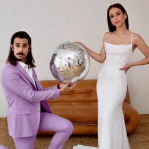 Lauren Lopez Instagram - 🚨WEDDING PHOTO DUMP PART 2 OF ??????🚨

Traditionally, your 2nd dump should be a full 5 months after your wedding so my timing is actually perfect, no feedback at this time thx!!!

1. Portrait w/ a big ball 💅🏼

2. Our vows to Diane ❤️

3. Diane said her vows, which were stunning and left everyone weeping 🥹 a few people passed out 🥹🥹

4. Cocktail hour🍸 we wanted to be a part of the whole cocktail hour and I’m so glad we did that; we got to talk to everyone!

5. I was surprised with a performance from Gash and Muff, part of my fave band @gunsnhosesrock !!!! 💀

6. They played my fave GnR song, You’re Crazy!😭

7. We were BLESSED to have queen Dusty Oakhunt herself leading Bingo! 👑 Thank you Dusty!!!

8. It was our dream for everyone to play bingo with us during dinner. The prize for winning was you had to give a speech. 😎

9. We named each table after an important animal in our life. We had the perfect amount of tables to include each of our 10 foster dogs, my childhood dog   Joey’s childhood rooster (coincidentally both named Kramer) and of course BabyD 🥰

10. We GOTTA shout out @jackiehorrorshow who made us INCREDIBLE drawings of each dog (  rooster) for the tables!!! We will treasure these forever and she did a SPECTACULAR job! 😭

📸by @annielesser 

(The next few dumps will be from the party portion and I’ll need like 10 separate posts for that bc we have the best pics of our guests on the dance floor and everyone looks so good💀sorry in advance)