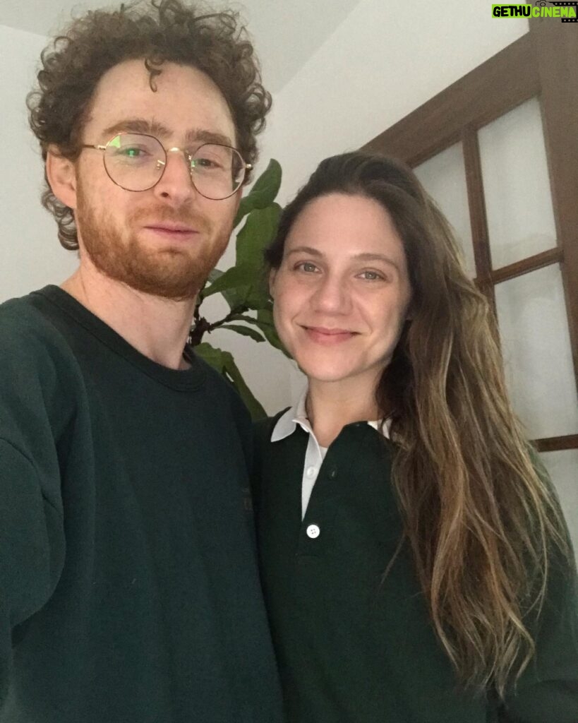 Lauren Collins Instagram - Reposting @jonathanmalen to show us in our most natural state. Him - wearing my cast sweatshirt from a 1997 community theatre production of Lillian Hellman’s “The Children’s Hour”. And me - wearing the men’s Zara shirt I bought him for Chanukah, smiling through the inevitable fate of being forced to finally watch Cast Away for the first time. Bonus swipe for Charlie in his most natural state eating crackers, oblivious to it all. #happyholidays folks
