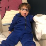Lauren Collins Instagram - Tips for toddlers wearing glasses if you’ve got ‘em! A few months ago we realized Charlie’s left eye wasn’t aligning properly. After confirming he has strabismus (lazy eye!) I was shocked to find out he would need to start wearing glasses immediately ALL THE TIME. Like… how was that going to work? He won’t even wear pants most of the time. One week in and he’s already a pro. I’m constantly amazed by how adaptable these little ones are. It’s gonna be a long road ahead of patching and possible surgery but I’m so proud of our little Charlie Lipnicki. “Did you know the human head weighs eight pounds?” ❤️❤️❤️