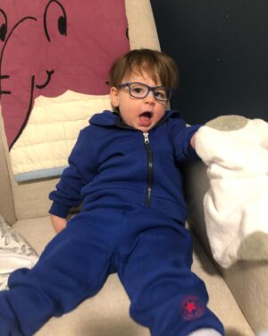 Lauren Collins Instagram - Tips for toddlers wearing glasses if you’ve got ‘em! A few months ago we realized Charlie’s left eye wasn’t aligning properly. After confirming he has strabismus (lazy eye!) I was shocked to find out he would need to start wearing glasses immediately ALL THE TIME. Like… how was that going to work? He won’t even wear pants most of the time. One week in and he’s already a pro. I’m constantly amazed by how adaptable these little ones are. It’s gonna be a long road ahead of patching and possible surgery but I’m so proud of our little Charlie Lipnicki. 

“Did you know the human head weighs eight pounds?” ❤️❤️❤️