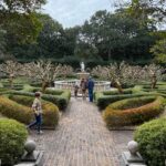 Lauren Liess Instagram - Garden dreaming at the @elizabethangardens 🌿 one of my favorite places to visit- especially in the winter when I’m really missing the green. Live oaks, budding daffodils a forest full of blooming star magnolias & camellias greeted us this time. I love being down in the Outer Banks and this trip was no exception 🌊 it’s always good for the soul. My next book - BEACH LIFE- comes out the weekend before Memorial Day to kick off the summer and it’s all about beach life- interiors, people places food, and how our minds bodies are affected by being near the ocean and how we can use that special time to find our truest selves 🤍 it’s filled with personal stories (lol goes way back to when D and I first met, chronicles how we found and fixed up @thelostcottage and finishes off with our most recently finished project- Dune House- and how some healing has been needed after that one.) BEACH LIFE: HOME, HEART & THE SEA is available now on preorder and I really think you’ll love this one 🤍 ok and one PSA because it’s that time of year again and because it’s in these pictures- NO. MORE. “crepe murder!” Lol PLEASE just don’t do it to your crepe myrtles!!! 🤣🤗