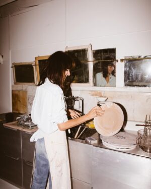 Leanne Ford Instagram - My most personal addition to this collection has got to be the Kiln Dinnerware Set — prototyped by yours truly in my very own ceramic studio (basement!) I by no means am a “true” ceramicist but I love to play on the wheel and with different glazes and forms. I basically hacked the system by convincing @crateandbarrel let me produce these pieces at scale in Portugal! For months I sat at the wheel and created version after version until I got it just right (perfectly wonky — just the way I like it) and then I would carefully pack that little prototype up and ship it off to the @crateandbarrel headquarters and they would take it from there.

// #LeanneForCrate shot by @amyneunsingerwith interior styling by @hilaryrobertson — Studio shoot shot by @sarahbarlow for @feelfree