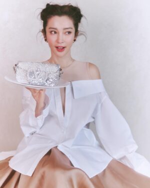 Li Bingbing Instagram - Minimal but unlimited. 
@maisonvalentino @wmagchina 
#UnboxingValentino