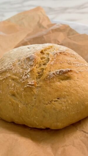 Liberté Chan Instagram - RECIPE ⬇️

3-Ingredient Bread

Plus, it’s dairy-free, egg-free and you can make it GF!

*  3 Cups Einkorn Flour (or use GF Baking Flour to make it 100% gluten-free; see notes)
*  2 Tsp Instant Yeast
*  1 Tsp Salt

Add: 1 ½ Cups Warm Water

INSTRUCTIONS
1. Combine flour, instant yeast, and salt in a bowl
2. Add 1 ½ cups warm water and mix well until the flour is combined. Once your dough is sticky, cover it and allow it to rise in a warm place for about 2-3 hours.
3. Once the dough has risen, place it on a floured surface and shape it into a round loaf - you can fold it a couple times, but do not knead it! You’ll loose the air bubbles! 
4. Preheat oven to 450F. Place a baking sheet or Dutch oven inside and leave it in there for 15 minutes.
5. Place your loaf on a piece of parchment paper, then transfer it to your heated baking dish or Dutch oven.
6. Bake for 30 minutes covered in the Dutch oven (you can add some ice cubes under the parchment paper to create some steam). Then remove the top and continue baking for 12-18 minutes. If you’re using a baking sheet with a water bath; fill the tray with boiling water in the oven and place it under your bread. This will create some steam (the added moisture prevents the dough from drying out before it has time to rise. It also helps create a thin, chewy and shiny crust).

Note: 
My husband has a gluten intolerance, so I originally made this bread with GF Baking Flour from @bobsredmill — it was good, but a little dense as the GF flour is made from rice. This time around, I tried the same recipe with Einkorn Flour, which contains gluten, however, it’s different from modern wheat since it only contains 14 chromosomes and modern wheat typically contains 42 chromosomes. Since the structure is different and the proteins are smaller, Einkorn wheat is easier to digest. Many people with non-Celiac gluten sensitivity (like my husband), can digest Einkorn wheat without any issues. However, depending on the severity of your intolerance, it may or may not be an option for you.

I used Einkorn flour is by @jovialfoods 🍞

#veganbaking #eggfree #dairyfree #veganbread #plantbased