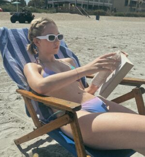 Lily Brooks O'Briant Instagram - summer preview ☀️💜
•
•
•
bikini : @prettylittlething 
•
#summer #summervibes #summerpreview #sunny #beach #beachlife #reading #readingonthebeach #beachday #book #booklover