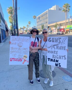 Linsey Godfrey Instagram - We will fight! We will fight for our daughters, our sisters, our mothers, our grandmothers, our nieces and cousins! That includes trans men and non-binary people. 
We had the honor of @victoriakonefal and @lindsbleepbloop joining us this time! What a powerful moment to share. I’m grateful for these amazing women in my life. We will fight! 

Fuck you SCOTUS! Religion has NO place in our government!
It’s a woman’s right to choose!
Reproductive rights are healthcare!

Now is the time to be loud. Now is the time to fight. Women of color have been telling us this was coming for years and we didn’t listen. 
We should have listened!
We need to listen now! 
They told us about forced sterilization of women of color at the border and in our native and black communities historically. 
We should have listened!
We need to listen NOW!
This will affect you. Someone you love. It doesn’t stop here. They’re going after contraceptives next. After that they’re going after Obergefell and then Lawrence. They’re coming for your way of life if you don’t fit the ableist, cisgender, heterosexual, Christian narrative.
Do NOT be complacent. Do NOT stay quiet. Silence is compliance.