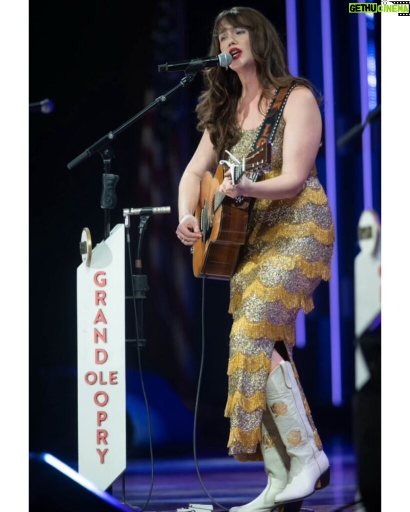 Lola Kirke Instagram - Still can’t believe I got to celebrate the release of my new EP “Country Curious” by doing this… what’s your favorite track so far?! 👢 @frauleinboots 💋 @bheadabe Dress #junecarter   📸: © Grand Ole Opry, photos by Chris Hollo