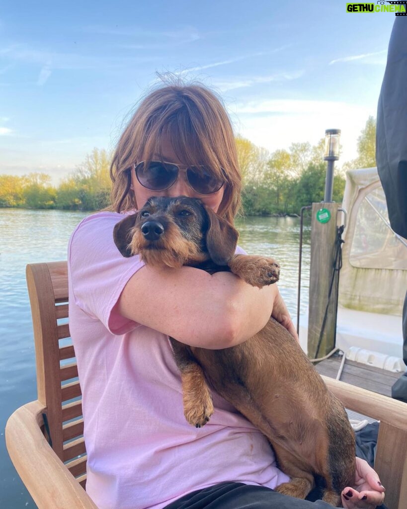 Lorraine Kelly Instagram - Love our wee @rubyisasausage - a lovely sunny evening - and lots of cuddles #sausagedog #cute #cuddles #love