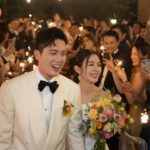 Louisa Mak Instagram - 唔少朋友都問我，哇搞三場婚禮，咪好辛苦！的確係，完事後直情要瞓足成個禮拜先recover到。其實唔係因為想搞到好「盛」大，而係源自於一個儘量make everyone happy嘅初心。 由於我和盛生好怕衝突、唔開心，所以我哋好早就決定將婚禮分幾次搞，而每一場都有各自嘅主角。大大小小嘅選擇就因住主角嘅需求而決定。 第一場盆菜宴，主角係老爺奶奶。我地盡跟圍村傳統，賓客絕大部份都係佢哋嘅親戚和朋友，而表演嘉賓方面，就邀請了奶奶很喜愛嘅李龍基先生。 第二場係正常擺酒，主角就係麥生麥太，菜式、流程、程序等都以佢地嘅意見為首。圍數全部歸佢地兩老，只受場地所限而唔使同對家協調😌 婚紗款色都迎合佢地喜好 至於第三場，就係更瘋狂嘅party，主角終於係我同盛生喇✌️因為之前已經take care 咗雙方父母嘅要求，呢次我哋就可以盡情選擇自己鍾意嘅嘢 - 戶外草地、樂隊歌曲、西式食物、無限酒精🫢… 爸爸媽媽雖然唔識欣賞，但係都好盡力去嘗試投入 😂 呢個安排，幫我地避免咗唔少衝突。男女家唔使爭圍數、長輩和後輩唔使爭論食物和形式係中式定西式；頭兩場我和盛生安分守己地做好兒子和女兒的本分，再於尾場玩得好盡興🥳（盡興到啲相都唔出得街🤪)。咁壞處就係… 真係好攰🫠。 每人屋企都唔一樣，家家有本難念的經，以上純粹share下我倆嘅經驗。總括來講，我爸爸媽媽、老爺奶奶也是非常隨和，我們非常幸運，而最後似乎各人都開心。不過同時都提醒一句，家人話「冇咩所謂，簡簡單單就OK」呢句說話… ummm.. 千祈唔好盡信呀🤪唔知你哋又有冇啲咩婚禮後嘅insight呢？喺comment share吓吖！ 最後，多謝 @agnesb_cafefleuriste 為三場婚宴都提供無限量超好食蛋糕😌 無論喺中式定西式婚宴、男家定女家、長輩定小朋友，蛋糕都一樣咁受歡迎😍 #勁甜麥 photo 1, 2, 5, 8 @taptsov_photography photo 4 @orbsproductionwedding photo 6, 7, 9, 10 @stein_image
