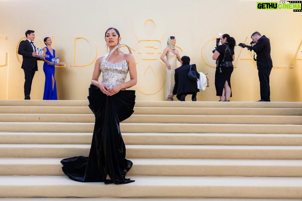 Luciane Buchanan Instagram - Mālo ‘aupito @goldhouseco for my first Gold Gala. 🌟 The imposter syndrome of being an A100 honouree was real, but to be embraced by the AAPI community out here is pretty dang special. Congrats to all the inspiring honourees and @bingchen for a wonderful event🙏🏽 Thank you @peakpasifika for always championing me in every milestone and bridging the gap for Pasifika artists in these spaces, when historically PI was included in the acronym but not in the conversation. Your work doesn’t go unnoticed. I share it all with you fam. 🫶🏽🌊 Finally, my wonderful glam team who managed to pull this killer look together over a txt group chat! DEAD. Only trying on a dress 3hrs before the event after I got on the earliest flight I could from a full week of night shoots 🫠 thank you for taking care of me, giving me a full on Princess diaries makeover making me look less sleep deprived 😘 y’all are all magicians I swear. And finally, to my darling manager (who’s not on insta but I’ll say it anyway) thank you for being the biggest ally for the past 7 years of working together. You’ve pushed down doors to get me here and we still have so much left to do my girl. Thank you for sharing this special night with me. 💕 Off to finish S2… Happy AAPI month. All eyes on Rafah. Love you mum, happy Mother’s Day. You’re my world. X Hair: @theartistred Make up: @cherishbrookehill Styled by: @benjaminholtrop Styles Assist: @emilykejohnson & @rasheedmkanbar Photographer: @hahnbo Photo assist: @chenbant Gown - Do Long - @dolongofficial Jewelry - UBS Gold - @ubs.gold Shoes - Sebastian Milano - @sebastianmilano_ Bag - @verafied_official Sunglasses - @lespecs