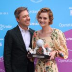 Lydia Hearst Instagram - I am truly honored to receive the Universal Smile Award from @operationsmile. And a special thank you to my husband @hardwick for presenting it to me! Every 3 minutes, a child is born with a cleft condition. With as little as $240, and in less than 45 minutes Operation Smile can bring immediate transformation to a child’s life, helping them to be able to breathe better, be able to eat better, and be able to speak better. Working with Operation Smile has been a completely life-altering experience for me. It is an organization I am truly passionate about and grateful to be a part of. I first became involved over fifteen years ago when I volunteered to help stuff envelopes for the Smile Gala in New York, and I have since been on a few volunteer missions to various countries where I have met incredible individuals and volunteers who dedicate their time and efforts to come together for the sole purpose of not only changing but saving a child’s life. Click the link in my bio to learn more about @operationsmile and please, share this cause with your friends, family and colleagues. There are so many children who need our help. And together we can save and transform children’s lives forever.