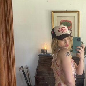 Maddie Hasson Instagram - arms out like an angel through the car sunroof