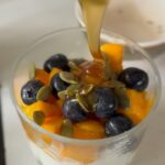 Madhuri Braganza Instagram - Woke up this morning and chose productivity. A wholesome chia seed pudding without coconut milk, to reduce calories. :) (Inspired by someone who made me an insanely yummy bowl last night. Was reminded that I used to do these things so often and stopped for no reason. Lol) Recipe: Skyr/ high protein yogurt Soaked chia seeds Fruit of your choice Seeds of your choice Honey if you so desire lol Enjoy 🥰🤤 #madrecipes #recipe #chiaseedpudding #healthyrecipes #healthyglass #healthybowl