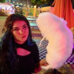 Madison De La Garza Instagram - here’s me eating cotton candy twice the size of my head :)