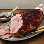 Maggie Beer Instagram – With just 22 sleeps until Christmas, it’s time to begin planning those merry menus. To help you get into the festive spirit, here are some Christmas classics that will spread joy amongst your nearest and dearest. Simply visit the link in our bio to explore them!

Baked Ham with Quince & Rosemary Glaze (pictured)
Turkey with Apple & Mint Stuffing (pictured)
Roasted Potatoes with Rosemary (pictured)