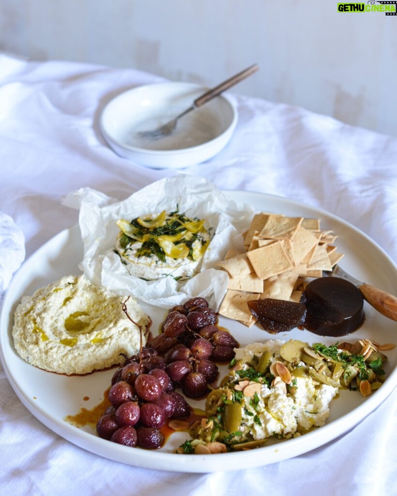 Maggie Beer Instagram - Graze the day away with a selection of moreish nibbles on a fulsome platter. Try this combination to delight your guests: - Baked Triple Cream Brie - Roasted Vino Cotto Grapes - Artichoke & Verjuice Dip - Crushed Olives with Ricotta, Almonds & Lemon Find these recipes via the link in our bio as part of our Make It a Maggie Easter eCookbook; simply join the Maggie Beer Food Club to receive your free copy (if you're already a member, find your eCookbook in the My Account section of the Maggie Beer online store). Tag a friend who you'd love to share this platter with! #makeitamaggieeaster #grazingplatter
