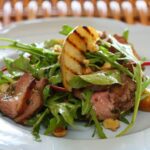 Maggie Beer Instagram – A moreish salad ideal for a lunch among friends, serve this Duck Salad with Grilled Pear, Rocket and Red Wine Vinaigrette with a glass of robust Barossa Valley red wine. 

View the recipe via the link in our bio and tag a friend who you’d love to share this dish with!

#makeitamaggiemoment #lunchrecipes