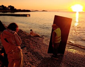Maggie Gyllenhaal Instagram - Happy BirthDay to @thelostdaughterfilm, released in theaters today. Out in the world now. This photo was taken by my wonderful first AD @simonhedges1972 on a sunrise shoot October 2020. I’ve been waiting to share it until today xxxx