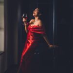 Malavika Sreenath Instagram - Red lips and wine sips for this season🍷💋 Concept & styling : @amritha_lakshmi___ @styledby_al_ Photographer : @premsampaul Mua : @sreegeshvasan_makeupartist @bridalmakeup_by_sreegeshvasan Costume : @alank.co Jewellery : @goodwillcollectionskerala Location : @azora.hotels Special thanks : @muzammilmooza