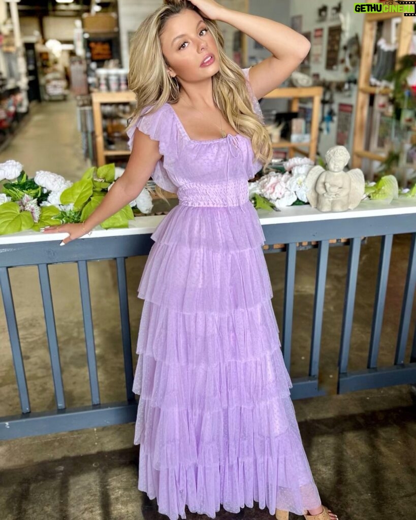 Mallory James Mahoney Instagram - 💜Doesn’t Mallory look absolutely stunning in this pretty party dress?!💜 Now at Painted Tree Highland Village. #dresses #partydress #newarrivals #ootd #outfitoftheday #whatiwore #boutiqueshopping #dfwshopping #glamorous