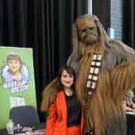 Mara Wilson Instagram - I had SUCH a great time at @comicconlpool! Thank you, lovely Liverpudlians, for making me feel so amazingly welcomed. And thank you to all the mums and dads who helped their daughters dress as Matilda! As you can see in this photo from @liverpoolecho, I was in tears over it. TOO CUTE! Also, just for fun, here’s me and Chewbacca. #liverpool #comicconliverpool #comicconliverpool2022 #monopolyevents