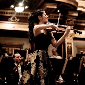 María Dueñas Instagram - Emotional moments at @musikverein.wien, beautifully captured by @julia_wesely_photographer 📸 
Bravo @viennasymphony and Krzysztof Urbański for the wonderful music-making and Danke Wien; immer wieder ein Genuss! Can’t wait to be back in November🌹

👗: beautiful new design by @annabelle_dress_atelier