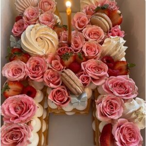 Maria Canals-Barrera Instagram - Spent the day yesterday celebrating my birthday with my favorite people, doing one of my favorite things…apple picking! 🍎🍏 Feeling grateful to God for so much. Thank you to everyone for all the birthday love ♥️ and to @crumbles__patisserie for another beautiful “M” cake this year! 💕