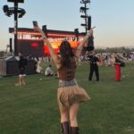 Marina Bastarache Instagram - COACHELLA DAY 1 🤠 the girls are girling! Outfit details - boots @revolve - skirt @HM - belt @revolve - top @ssense - bag @re.tyche