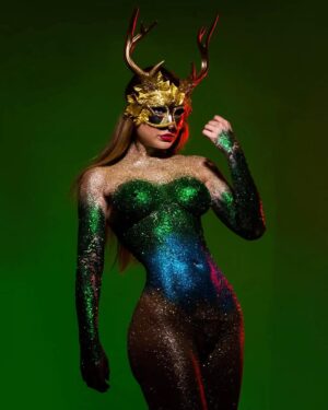 Marina Valmont Instagram - All that glitters isn't gold but it could be 😏 Bodypaint by the internationally renowned artist and reality TV star 🎨@fernello @alxguzmanphotography #cosplay #art #bodyart #ibiza #artistsoninstagram #bodypaint #spain #glitter #mask #skinwars #avantgarde #costumeparty #sexy #saturday #partydress #curves #marinavalmont