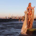 Marla Maples Instagram – ✨💛 Feeling Golden 💛✨ Thank you once again @fadilberishaphotography for always making me feel like a Queen! May we always shine the Light of Love above all else.  #fadilberisha #marlamaples #NewYork #skyline #shine #riseaboveyourfears #fashion #over50 #modelpose 😂
