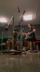 Marlhy Murphy Instagram - a lil clip of tracking the drums for the outro of “too close for comfort” my hand was taped up and it was the last song of a veryyy long day of recording lol🧡⚒️
