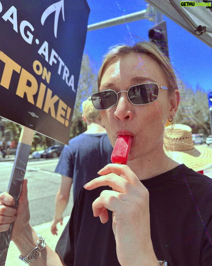 Masha Mashkova Instagram - I am a SAG•AFTRA member which means as an actress it is my time to show solidarity to the community and support TV/Theartical/Streaming Strike. As a member I got a bulletin of what I can NOT do during the strike(no acting, no ADR/looping, no festivals, no promotions of upcoming projects, even on social media etc). It is not mandatory to go out on the streets though, totally your choice. I was hesitant at first… as a Russian, I am kind of scared of protests…but curiosity and the desire to try to live my new life as a responsible civilian, won… What a beautiful day it was, but there is something I can’t comprehend…. none of us was beaten up(отпизжен по нашему)) by OMON today🤔 What a joy to watch The First Amendment in action. Feels like I am an alien from another Planet…. Wish such an experience for my motherland as well…As humans, it is our right to peacefully protest if we want a change. P.S. Got a free popsicle as well!💃🏼 it was a really hot day(Шуточки разгневанных патриотов и говножурналистов, как я сосу у страшной и ужасной Америки-welcome, если вдруг более достойных дел не появилось.) #sagaftrastrong #sagstrike
