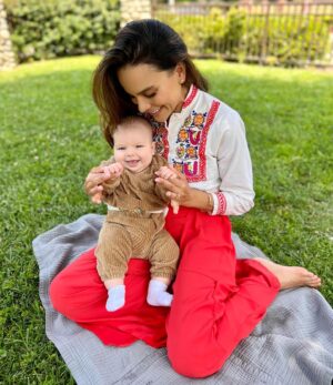 Maya Stojan Instagram - While I was pregnant with Leo I told myself that I would never be that mom that shares pictures of her kid all the time. Cut to 😳
He just brings me so much joy and I hope he sparkles your day too! 💫
Sweet fact: The shirt I’m wearing belonged to @toddclever ‘s mom, my beautiful mother in law. ♥️