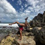 Meagan Martin Instagram - Throw back to handstands and beach time in one of my favorite places of all time, Kauai ❤️! Always bring my @athleticbrewing refreshments with me 🍻🤩!