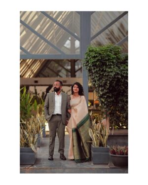 Meetha Raghunath Instagram - Sarees of my Wedding.

Part 2 - The Wedding! 

1. The blue and red silk saree with golden zari - As a family we love single colour solid bodied sarees with traditional borders. My mom got this for herself first but I flicked it from her for the pre wedding ceremony and I’m glad I did. This is also from Anya.
2. The cream tissue silk saree with a green pallu - I only wanted to wear sarees for any occasion associated with the wedding. I found this gorgeous saree that’s tissue silk and has a beautiful green pallu. Wearing a sleeveless green blouse, I sorigified (read tucked in) the pallu and danced away at the cocktail party. I got this from Anya (again). 
3. The cream silk saree with orangish red thread worked border - This is one of the first sarees I ever got. We went to Mahaveers Coimbatore just to see sarees with no intention of buying any immediately but as soon as I saw this I knew this was it. Red and white are traditional Badaga colours and I couldn’t have asked for anything better.
4. The pink silk saree with a green border - My mom and sister had selected this from Nalli in T Nagar when I was promoting Good Night. I went in after work and loved it when I saw it because it has such a distinct tone of pink to it with impeccable zari work. 

We wanted the engagement and the wedding to be a super chill intimate party. So I draped my own sarees, did my own hair and make up and got ready before the rest of the family.( Also I had my mom and sister for any help I needed, so 🌝) I also wore kannadi valayals (glass bangles) because I love them! 

I love it when I know where someone got a piece of clothing I like from. So this me sharing where I got my wedding sarees from. This is not an ad, nobody is paying me for it. I love the sarees I got for my wedding and I’m really grateful for them. I hope you get to wear all that you love and enjoy too🌻

Thank you for your time! 

@weddingsbyvasanth