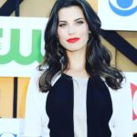 Meghan Ory Instagram - It’s rainy and cold today….Reminiscing to dress up day wearing beautiful clothes. Styled by the fabulous @cristinaehrlich @j_mendel dress & gorgeous date @marghelgenberger @cbstv ❤️