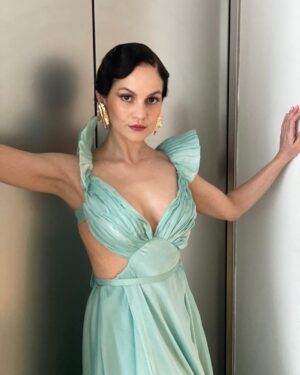 Melanie Zanetti Instagram - A veritable mountain of photos from the wonderful premiere of Gabriel’s Redemption in last night. 
Huge thank you @toscamusk for creating such a brilliant eve in London, to @lipstickkelly for my gorgeous luminous make up look and @lukepluckrose for the finger waves of my dreams and to my manager @bethslg for once again finding the best talent and organizing everything! 

And to @veronicaspadaro who designed this dress with me, made half of it in Italy and half of it here in London who took me seriously when I said ‘can we make the sleeves feel like fish fins? I’m thinking 1930’s Hollywood meets mermaidcore straight out of the ocean’ and she TOTALLY nailed the brief. Thank you for your creativity, incredible skill and beautiful friendship, I just adore you! 💖✨💖✨

Make up @lipstickkelly 
Hair @lukepluckrose 
Dress @madetomeasurenyc @veronicaspadaro 
Shoes @jimmychoo 
Bag @olgabergofficial