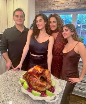 Melina Kanakaredes Instagram - Happy Thanksgiving from my family to you and yours! 🍁♥️ and all adorable pooches (like Enzo) who are “tempted” by the holiday feast!😂♥️🐶🍁#grateful