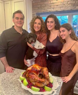 Melina Kanakaredes Instagram - Happy Thanksgiving from my family to you and yours! 🍁♥️ and all adorable pooches (like Enzo) who are “tempted” by the holiday feast!😂♥️🐶🍁#grateful