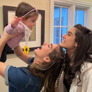 Melina Kanakaredes Instagram - My hubby and I split the lucky coin between our two pieces of Vasilopita (Greek New Years bread)- definitely a sign of teamwork and good fortune! Love you Pete! We celebrated with our wonderful family and toasted to our new niece Deme as the best of 2022. Lastly,  I had to Dance my way into 2023- just couldn’t help myself!😂♥️😘 Happy New Year to all! May 2023 be the best year ever for everyone!
