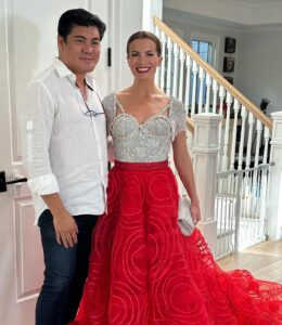 Melissa Claire Egan Instagram - The story of THE DRESS! @theolivertolentino has been so good to me! I screen shot this dress on his Instagram over a year ago and said, “if I’m ever nominated again, I have to wear this dress”. Cut to last spring, I was lucky enough to be nominated, but was going to be 7 months pregnant at the Emmy’s. Oliver said no problem, he would make me the “pregnant version” of this dress. Could you die?! It was a shortened bodice and the skirt became more empire waist. Then the strike happened and the Emmy’s got pushed and here we are with the original version of the dress! Oliver has been so wonderful and I’m forever grateful to wear this piece of art!💃🏻❤️