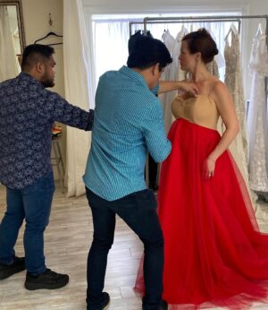Melissa Claire Egan Instagram - The story of THE DRESS! @theolivertolentino has been so good to me! I screen shot this dress on his Instagram over a year ago and said, “if I’m ever nominated again, I have to wear this dress”. Cut to last spring, I was lucky enough to be nominated, but was going to be 7 months pregnant at the Emmy’s. Oliver said no problem, he would make me the “pregnant version” of this dress. Could you die?! It was a shortened bodice and the skirt became more empire waist. Then the strike happened and the Emmy’s got pushed and here we are with the original version of the dress! Oliver has been so wonderful and I’m forever grateful to wear this piece of art!💃🏻❤️