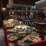 Melissa King Instagram - I don’t half ass anything. 🤪 I’ve had an all Asian grazing board vision hiding in my head for a while and am so proud to debut it to friends in celebration of the Lunar New Year. Along with some usual suspects of charcuterie, dips, vegetables, I loaded the 13 foot table with dim sum, every nostalgic Asian snack you can dream of, and a few roasted suckling pigs for the win! We built a second table just to hold the desserts (egg tarts, fried sesame balls, lucky candies, lychee jello cups, and more). I felt emotional after stepping back and seeing all the nostalgia captured on the table. Grandma would have been so proud and parked up next to the kumquats and licorice watermelon seeds. Thank you to all the friends that came out to support and celebrate. Cant wait to go even harder next year! Happy year of the dragon everyone!🧧🐲🐉 Thank you to @staym88 and the team, @chefgingerjpierce and the @1hotels team, @therealtsarnicoulai and all our sponsors for helping me make this come to life and being a big part of our Lunar celebration. #lunarnewyear #chefmelissaking #melissaking #chinesefood #cantonesefood #chinese #foodporn #grazingboard #charcuterieboard #asianfood #asiangrazingboard #LNY