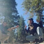 Melissa O'Neil Instagram - Colin and I were cruising through this special area in the San Bernadino National Forest and came across this circle that had a little mound of dirt with pine needles covering it like a seat. Looked like a good spot to tend a fire or, as we discovered, to watch the sun begin its descent. We sat there for a little while listening to the riiiccchh silence. So many special treasures within this semi-secret forest entry. Love sharing these special moments with my Bro. We went back the next morning with Tater. ✨🌲🌳🦅✨ Tonight is our season finale of The Rookie!! I’m going to try and dig up some content for you guys. Still resurfacing from a super full week with my family being in town. Hope you’re doing well.🏵
