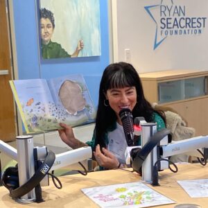 Melissa Villaseñor Instagram - Still smiling from this visit at @childrensnational. Thank you to the patients who shared their stories and made this such a special time. Extra shoutout to Ren for my crochet frog. Wishing the best for these kiddos. The book i read was “The Fantastic Bureau of Imagination” by one of my fave artists @bradmontague !

P.S. Donations this holiday season light up Dr. Bear, their mascot, at the hospital to brighten patients’ days 🌟❤️– link in their bio!