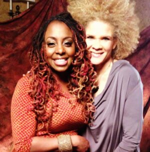 Michaela Angela Davis Instagram - a lil ode to my afro on 
world afro day

my afro is a world
of naps holding tight to
each other 
reaching, rising up & out 
cacophonous curls 
refused to be ruled
linked & loc’d
forming a crown of gold
round my face 
roaring like a mane 
glowing like a halo 
my afro is the satellite 
to the ascended masters
the ancient ones 
the angels
the ancestors 
#WorldAfroDay #passtheCROWN